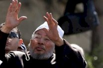 اتحاد القرضاوي يدعو لإعادة حكم الإخوان 