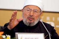 القرضاوي يربط بين داعش و