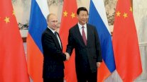 الصين تعد بتعزيز التعاون مع روسيا