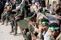 العراق بين مطرقة داعش السني وسندان الحشد الشيعي