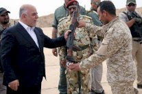 العبادي يعيد هيكلة الجيش باحالة 300 ضابط إلى التقاعد