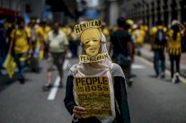 تظاهرات بماليزيا تطالب باصلاحات واستقالة رئيس الوزراء