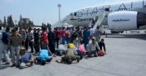 عودة 544 نازحًا مصريًا من ليبيا