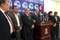 تراشق اتهامات طرفاها علاوي ومؤسسات إعلامية