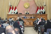 العراق: موازنة تقشف وقروض خارجية وقطع من الرواتب