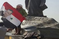 صورة لبشار الأسد في بغداد تستفز العراقيين