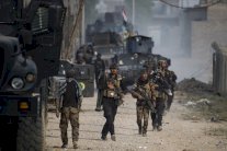 تحرير أحياء وإسقاط طائرتين في الموصل