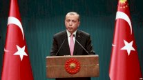 أردوغان يعلن تطهير 900 كلم من 
