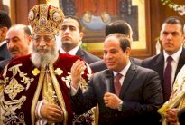 السيسي يزور الكاتدرائية ويتبرع لإنشاء أكبر كنيسة في مصر