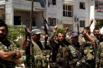 ‎الفصائل المسلحة تحاول أن تحتمي بأحرار الشام