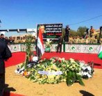 علم العراق فوق قبر طالباني بعد أن غاب عن جنازته