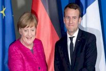ميركل وماكرون يشاركان في قمة المناخ في بون