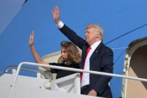 ترمب يعود الى واشنطن والتحقيقات بشأن روسيا تخترق دائرته المقربة