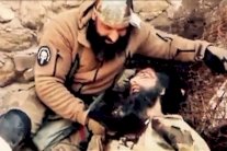 «أبو عزرائيل» يبرر حرقه لجثة داعشي