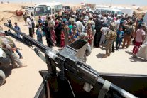 إتهام بيشمركة كردستان بإحتجاز آلاف الفارين من المعارك