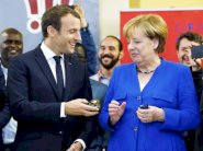 ماكرون ينافس ميركل على قيادة أوروبا