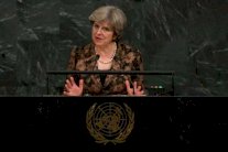 ماي تدافع عن عالم تعددي بخلاف ترمب