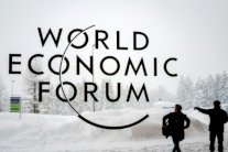 ميركل وماكرون تحت الأضواء في دافوس