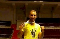 مصري متوج بذهبية رفع 