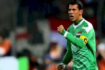 يونس محمود يرفع علم بلاده في افتتاح آسياد 2014