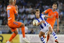 سوسييداد يسدي خدمة لبرشلونة باجباره فالنسيا على التعادل