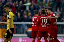 بايرن يذل دورتموند ويواصل تحليقه بفضل مولر وليفا