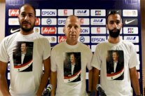 مدرب سوريا يضع صورة بشار الأسد على قميصه