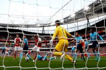 أرسنال يتقاسم الصدارة مع مان سيتي وفوز صريح لتشلسي