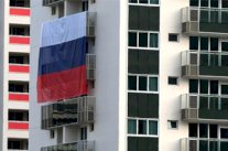 الروس ينشرون علمهم بكثافة في القرية الاولمبية