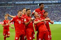 ثلاثية ليفاندوفسكي تمنح بايرن فوزه الأول وفرايبورغ وليفركوزن يلحقان بدورتموند