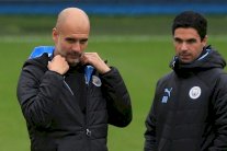 غوارديولا يؤكد وجود اتصالات بين أرتيتا وأرسنال