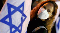 إسرائيل: وضع الكمامات لن يكون إلزامياً في الأماكن المفتوحة اعتباراً من الأحد