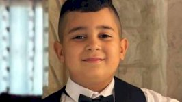 أصيب آدم ذو الثمانية أعوام برصاصة في الرأس، أثناء هروبه من المدرعات الإسرائيلية