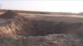 حفرة ظهرت في قاعدة نيفاتيم بعد الهجوم الإيراني