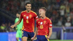 ميرينو وأولمو من منتخب إسبانيا يحتفلان بهدف ضد جورجيا في بطولة أمم أوروبا 2024 