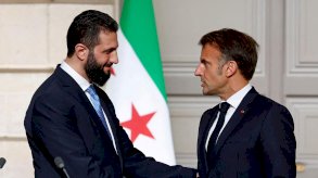 الرئيس الفرنسي ورئيس المرحلة الانتقالية في سوريا - Reuters