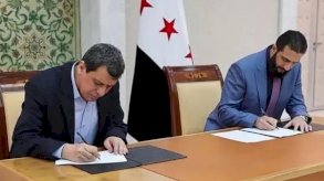 أحمد الشرع ومظلوم عبدي يوقعان على اتفاق 10 آذار (مارس)