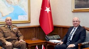 وزير الدفاع التركي يشار غولر خلال اللقاء مع محمد الحداد