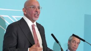 ناظم زهاوي متحدثا الاثنين من منصة حزب الاصلاح البريطاني 