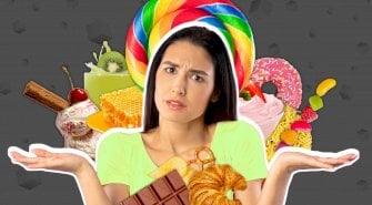 فتاة أمام خلفية تحوي طعام وحلويات وترفع يديها للتعجب - BBC, Getty