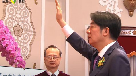 الرئيس التايواني المنتخب لاي تشينغ-تي خلال تأديته اليمين الدستورية في القصر الرئاسي في تايبيه. لقطة مأخوذة من بث فيديو مباشر في 20 أيار (مايو) 2024